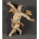 Schwebender Putto. Deutsch um 1900. Massivholz geschnitzt und bunt gefasst, H= 70 cm.