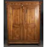 Schrank. Deutsch 19. Jh. Massiv Nussbaum, teilweise furniert, H=212 cm, B=173 cm, T=63 cm.- - -25.00