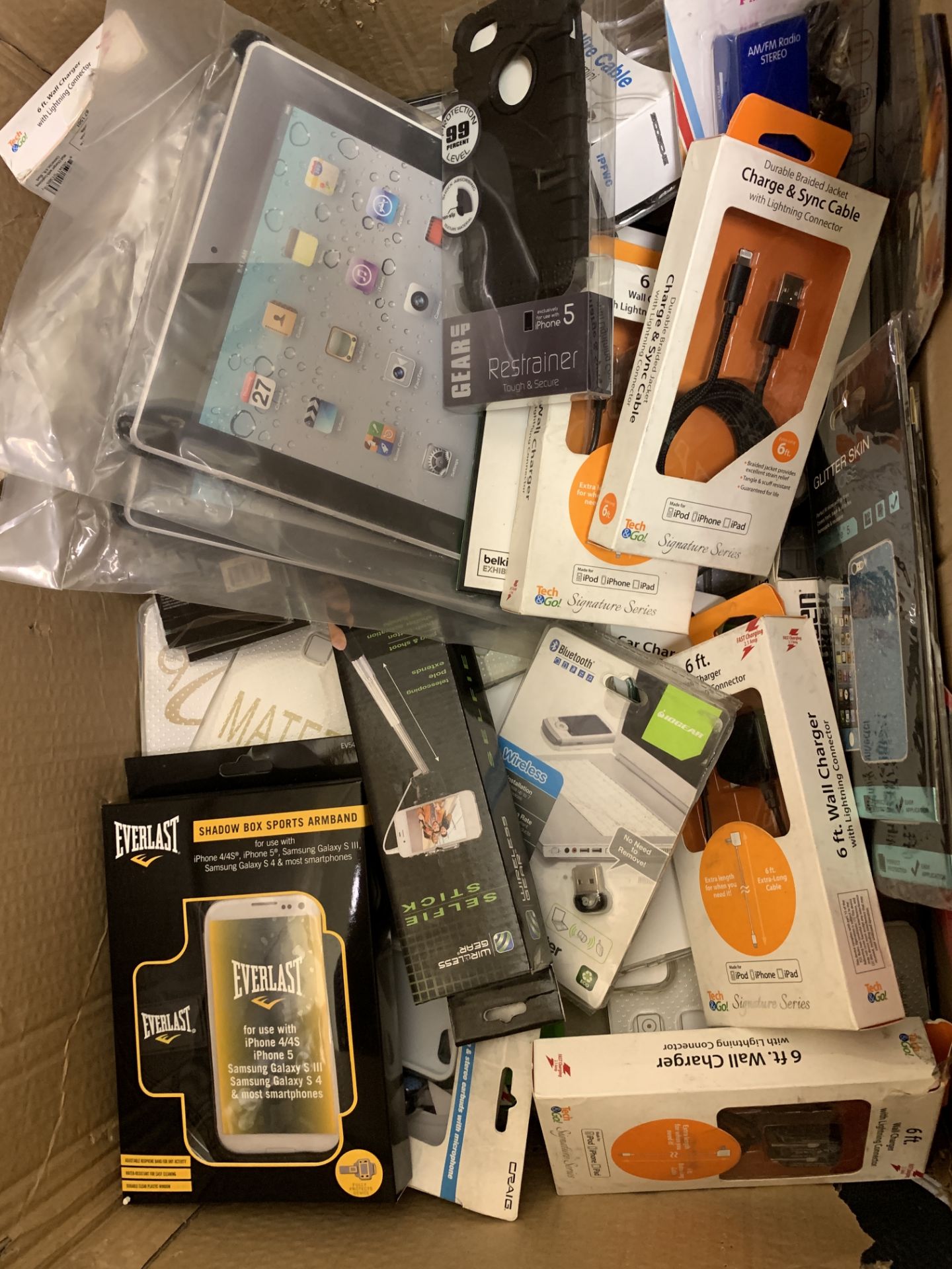 LOT OF MISC CELL PHONE AND ELECTRONICS ACCESSORIES. CASES, CHARGERS, SELFIE STICKS, ETC.