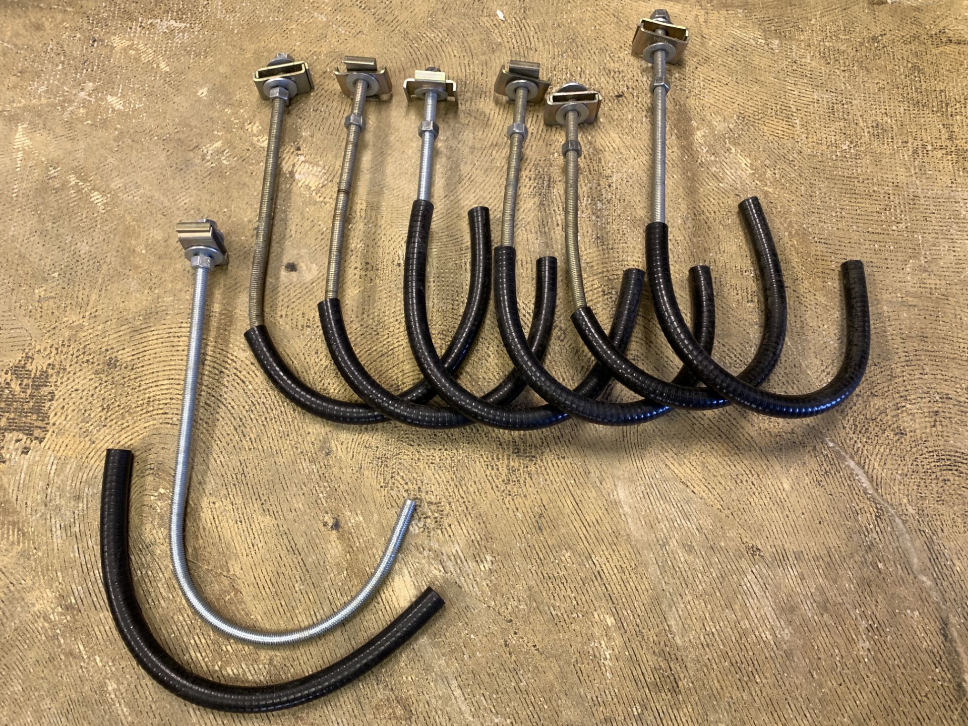 LOT OF 7 REBAR HOOK SUPPORTS WITH THREADING AND NUT/BOLT HARDWARE AND PVC TUBING