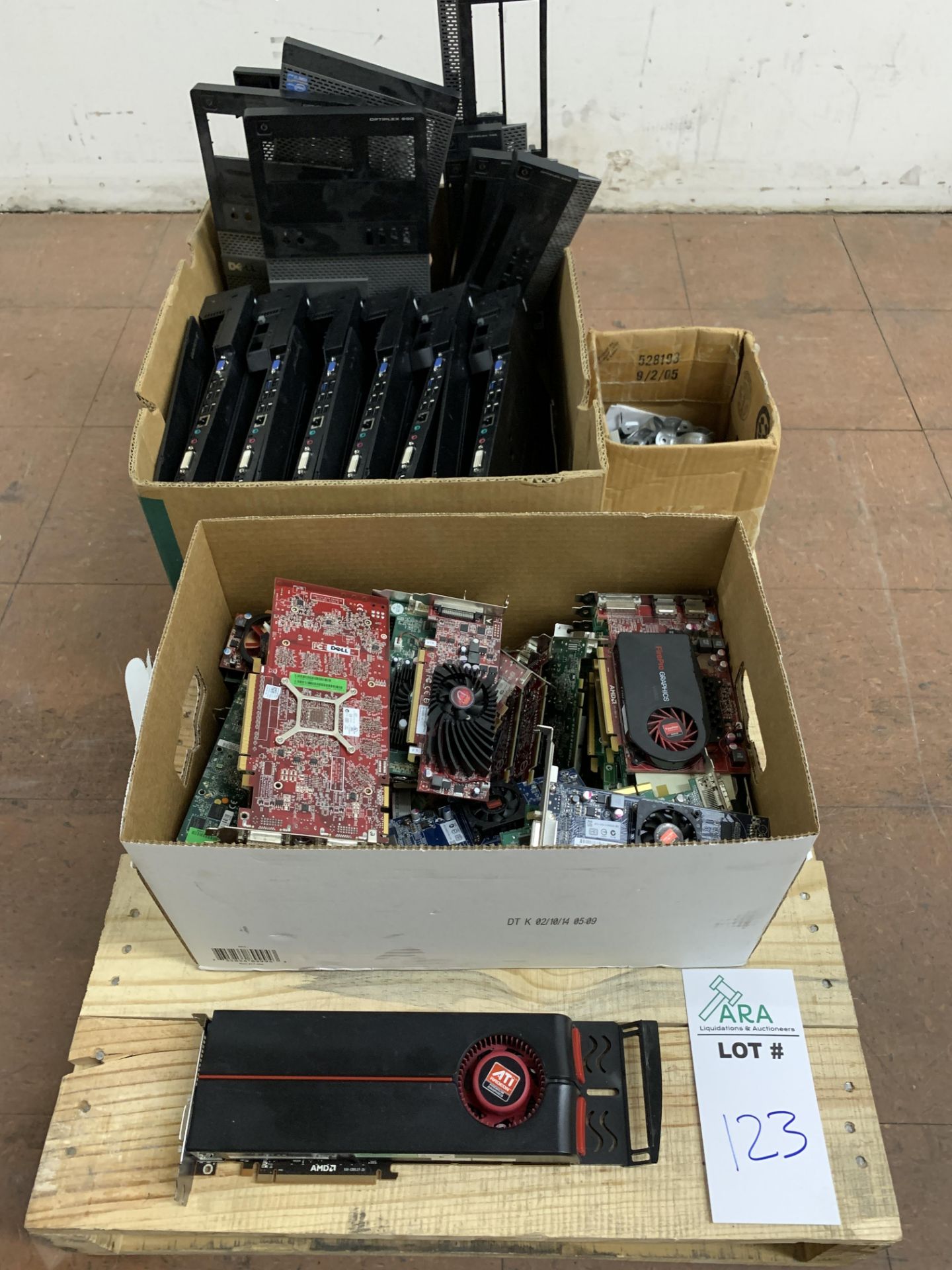 LARGE LOT OF VIDEO CARDS, LAPTOP CHARGING STATIONS, COMPUTER TOWER FRONTS