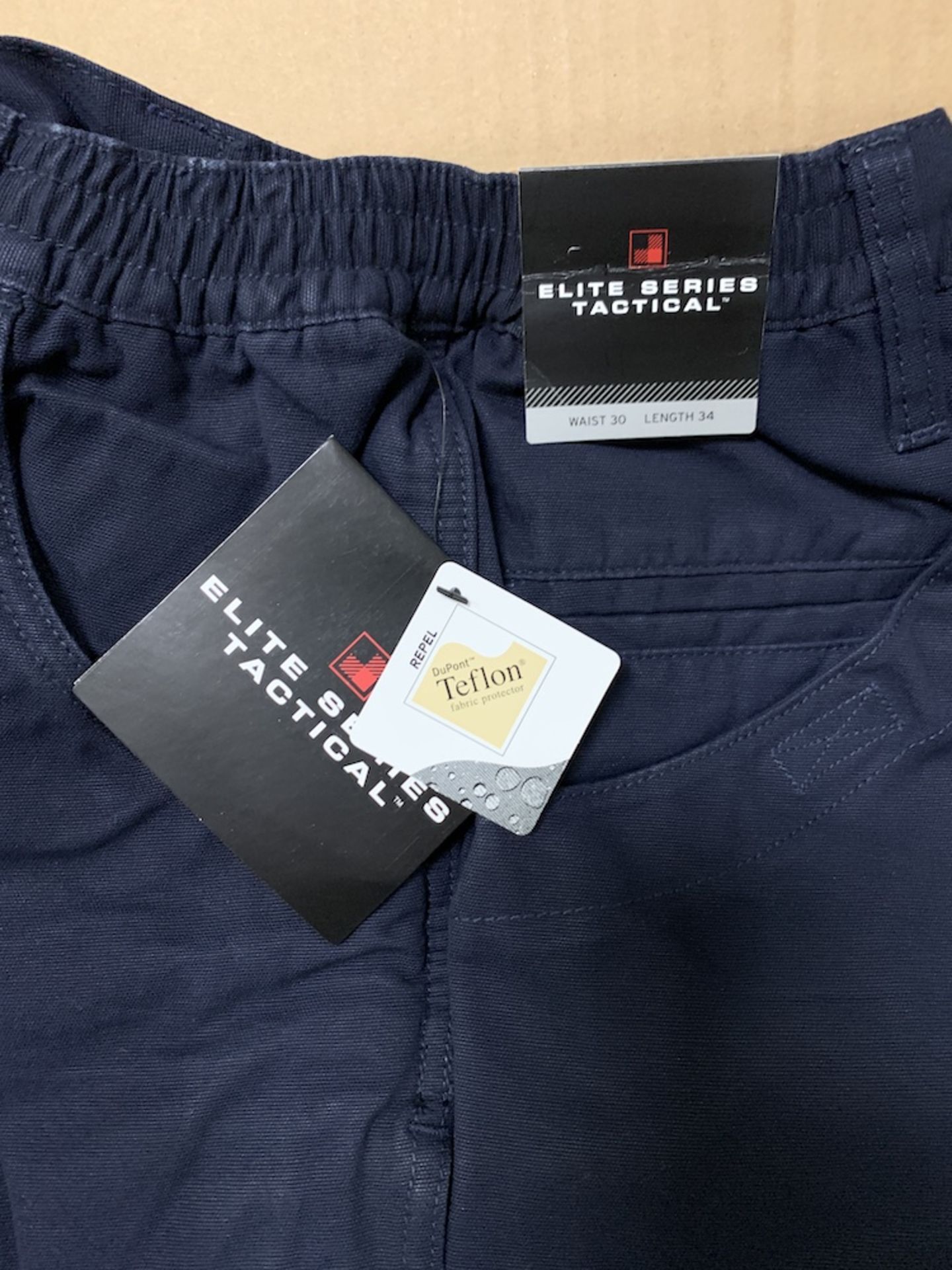 51 Pairs of Woolrich Elite Series Tactical Pants, Teflon, Navy, New, Various Sizes, Retail $1,275+ - Image 5 of 6