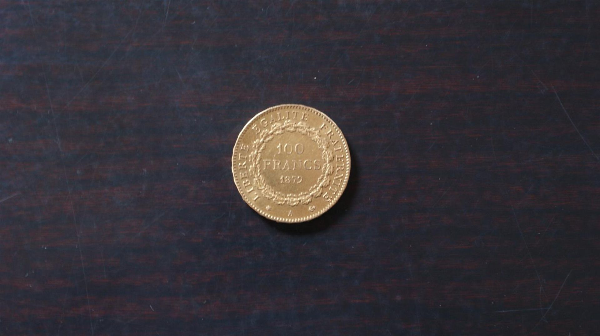 1 pièce de 100 francs or, 1879, atelier A pour Paris. 32g -