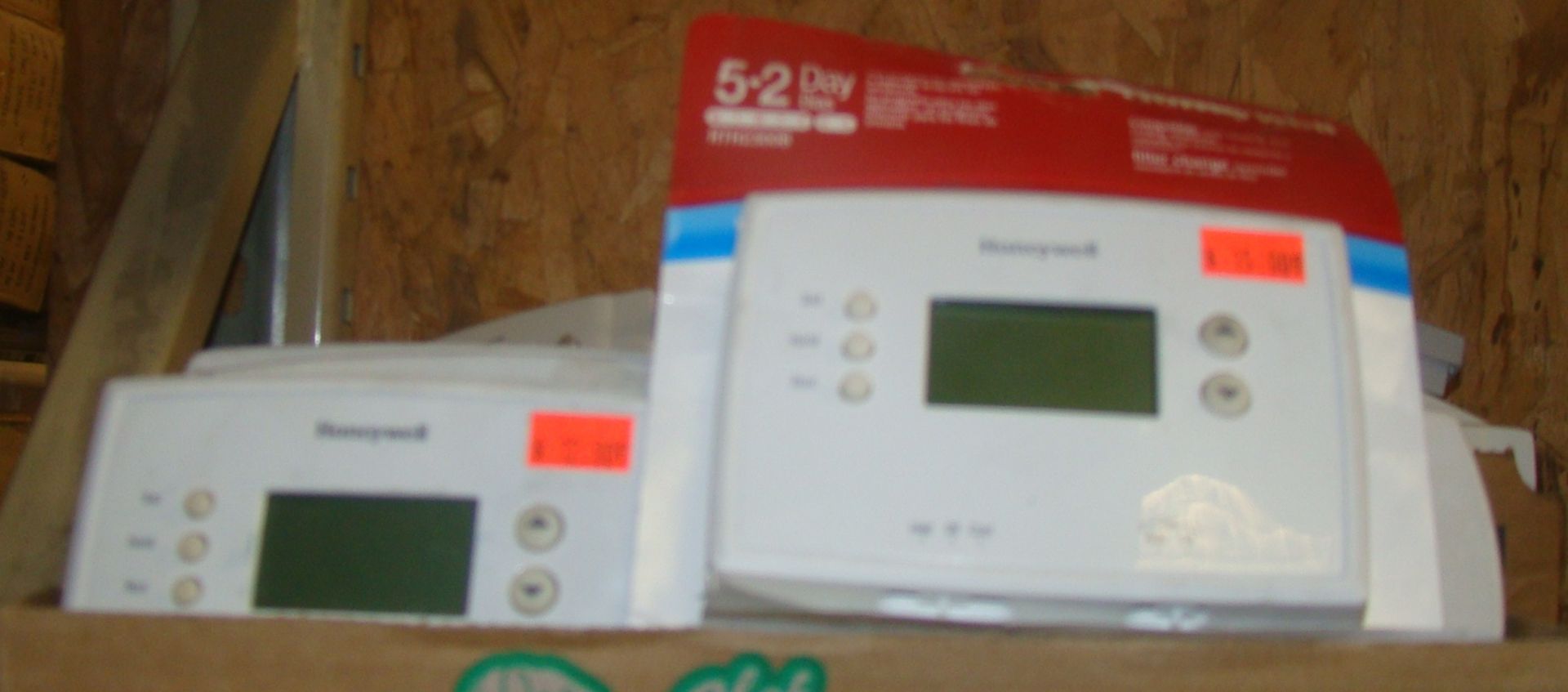 2 Small boxes of misc thermostats