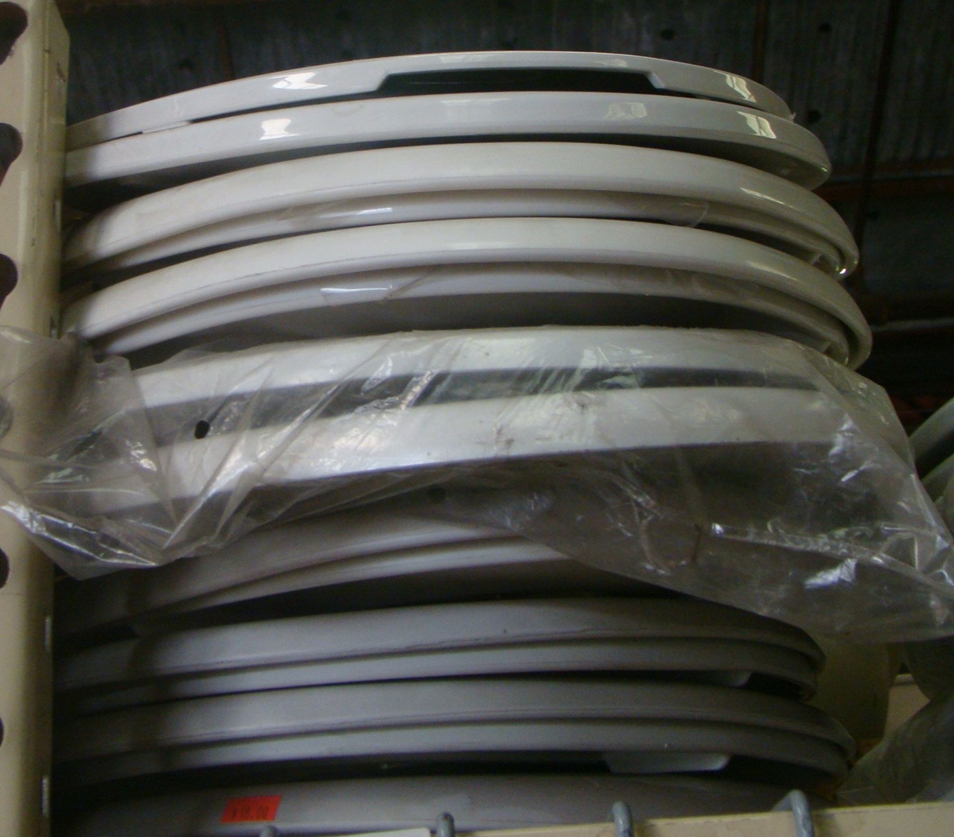 Stack of toilet lids