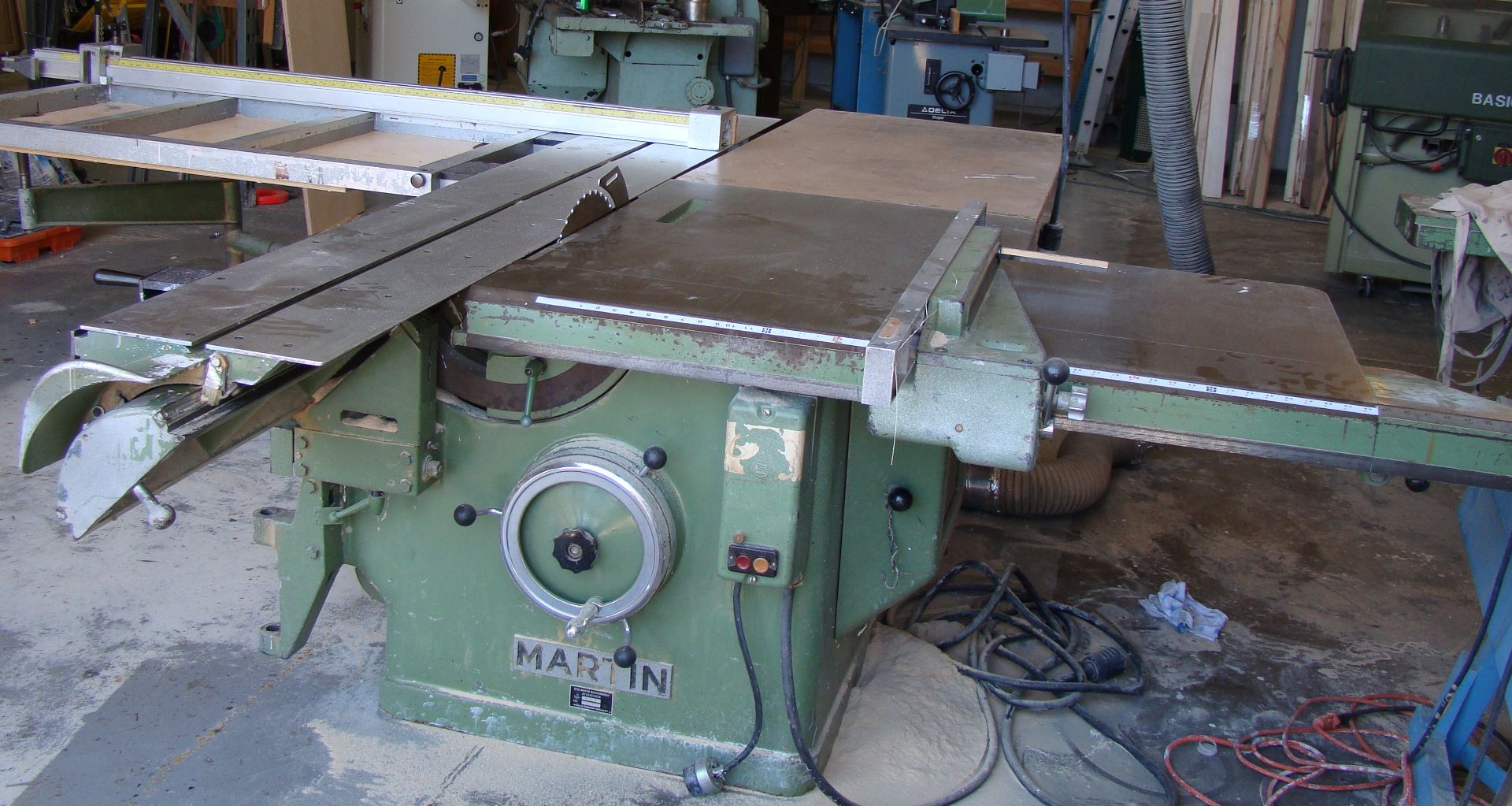 Martin Sliding Table Saw Model # T75G Has tilting arbor 0-45°,13½" x 99", sliding table, 6.6HP 220/