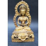 White Tara, in sitting position on high base and flame with halo, bronze cast with fine hand