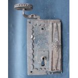 Classicist door lock , fine iron work with flower decoration and handgrip, functionable, key