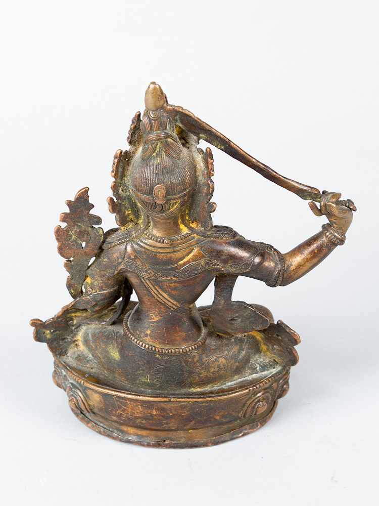 ManjushriManjushri, bronze cast with fine hand finish and engravings light brown patina with sword - Image 3 of 3