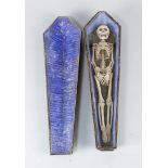 Tödlein,German Anatomical modelTödlein, model of wooden sarcophagus with skeleton inside blue