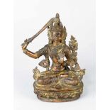 ManjushriManjushri, bronze cast with fine hand finish and engravings light brown patina with sword