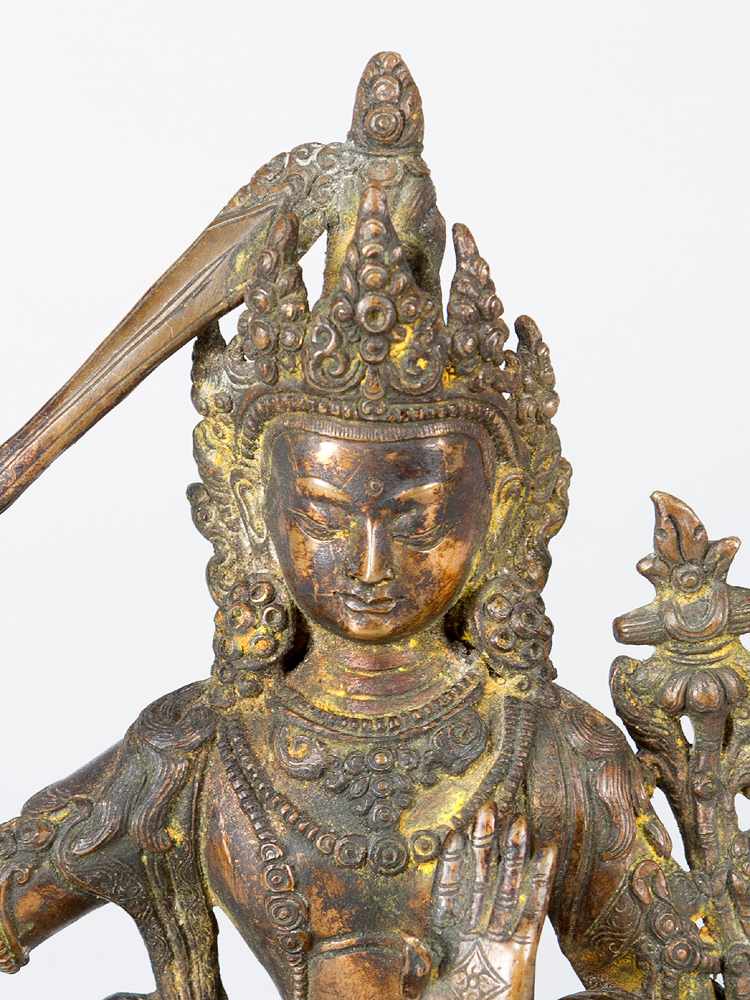 ManjushriManjushri, bronze cast with fine hand finish and engravings light brown patina with sword - Image 2 of 3