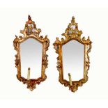 Pair of Venetian mirrorsPair of Venetian mirrors, wood carved with original gilded and open work