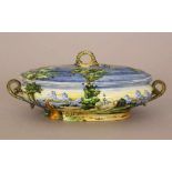 Italian ceramic terrine with lid, pained,19. Century25x12cmThis is a timed auction on our German