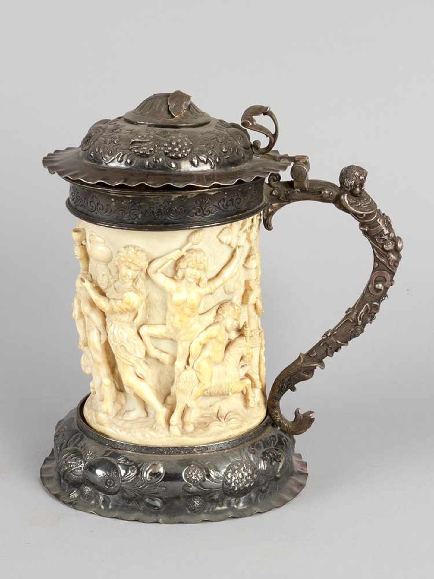 German tankard with silver mounted feed top lid and handgrip, chased and engraved with fruits,