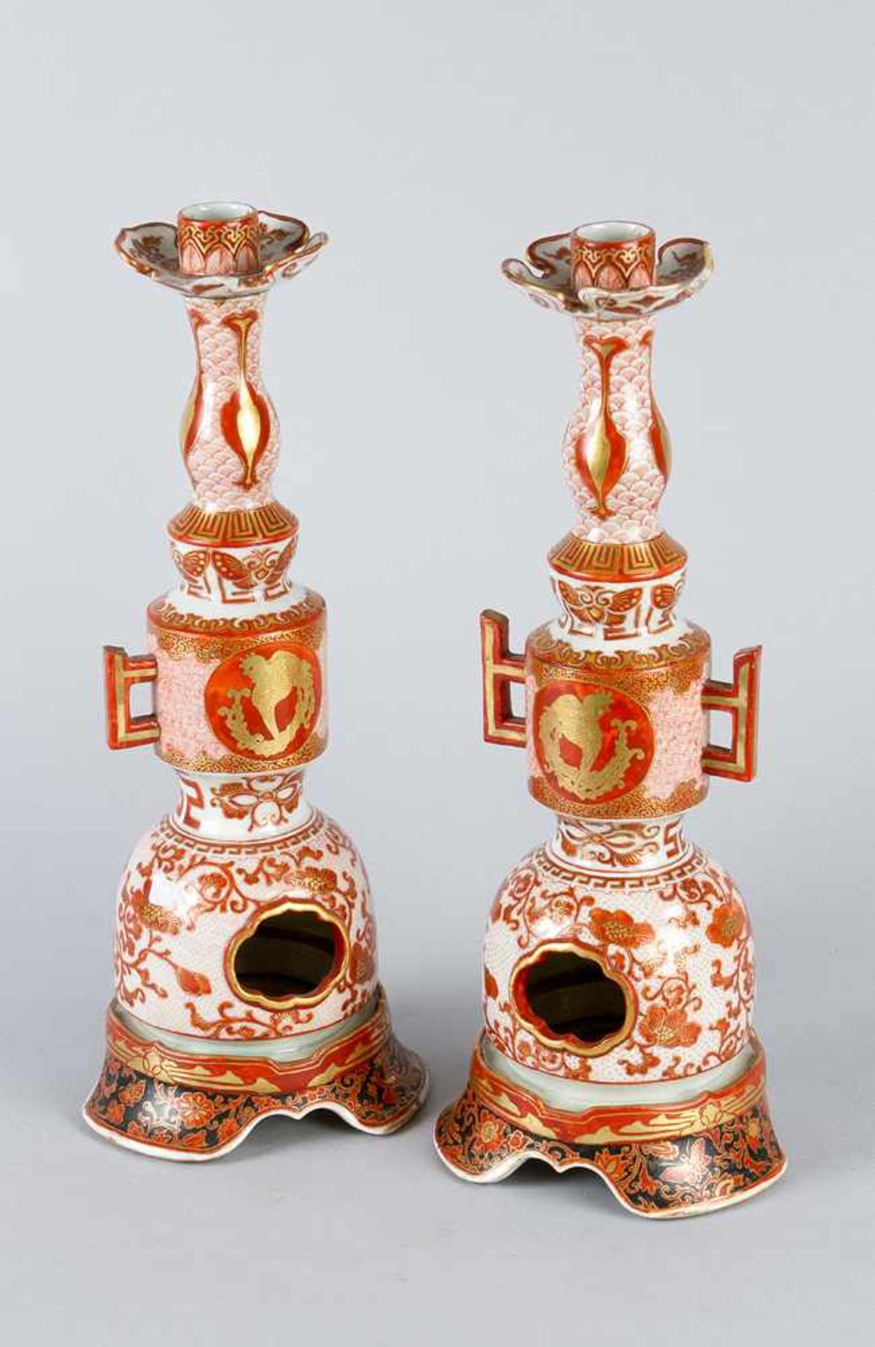 Pair of Imari Candle Sticks, porcelain, each with spout and handgrips, open work, round bowed