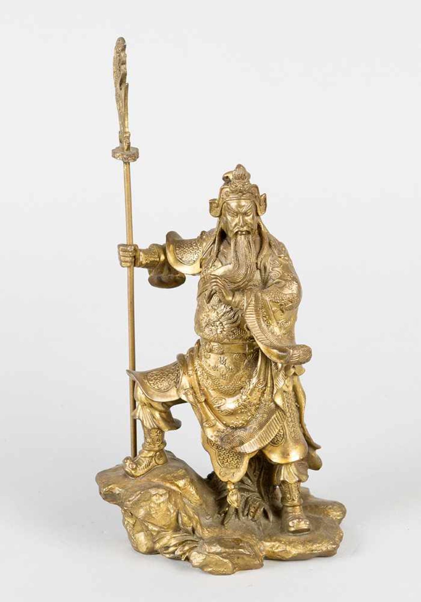 Chinese warrior in standing position with spear on naturalistic base in traditional dress. Bronze