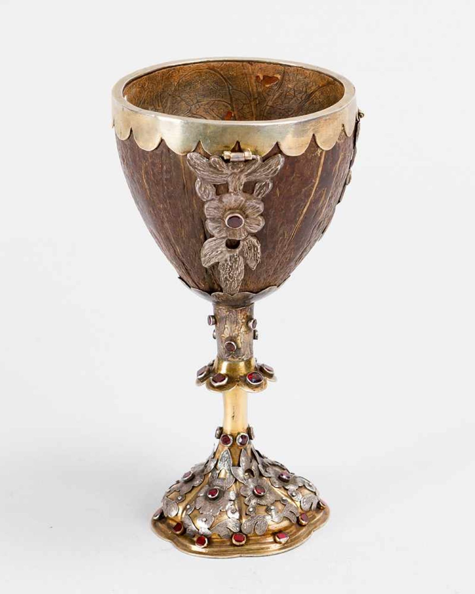 Transylvanian coconut goblet on central foot with fluted round base; silver gild, with open work,