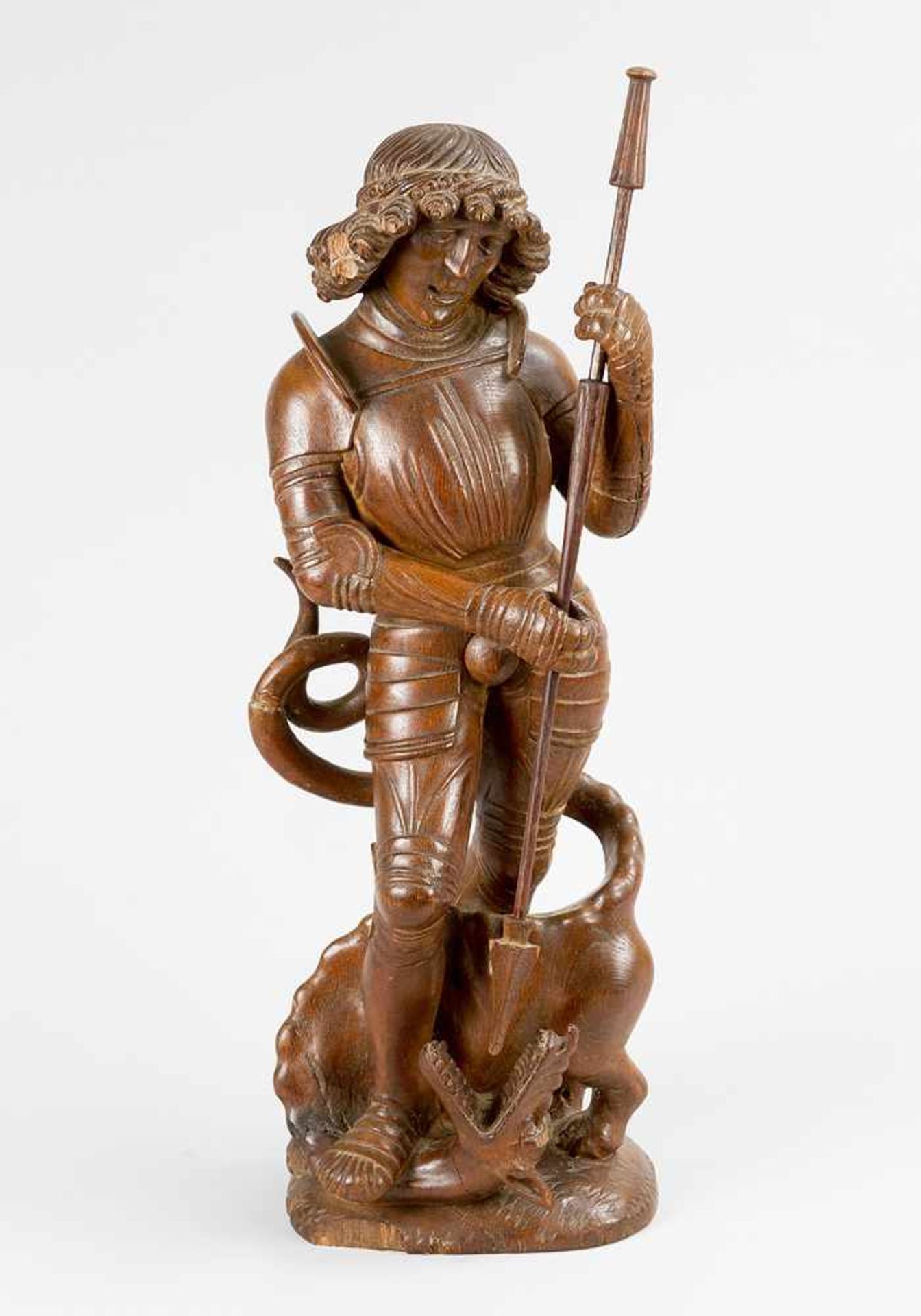 German sculptor 15th Century, St. Michael with the dragon, oak wood carved, on naturalistic base; on