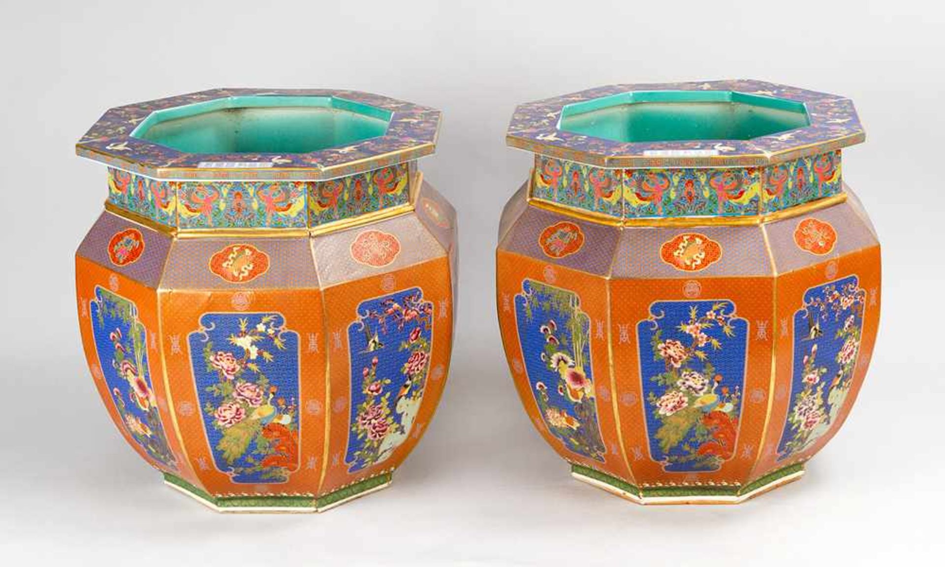Pair of Chinese Bowls, porcelain in octagonal shape, thin neck with painted fields of dragons and