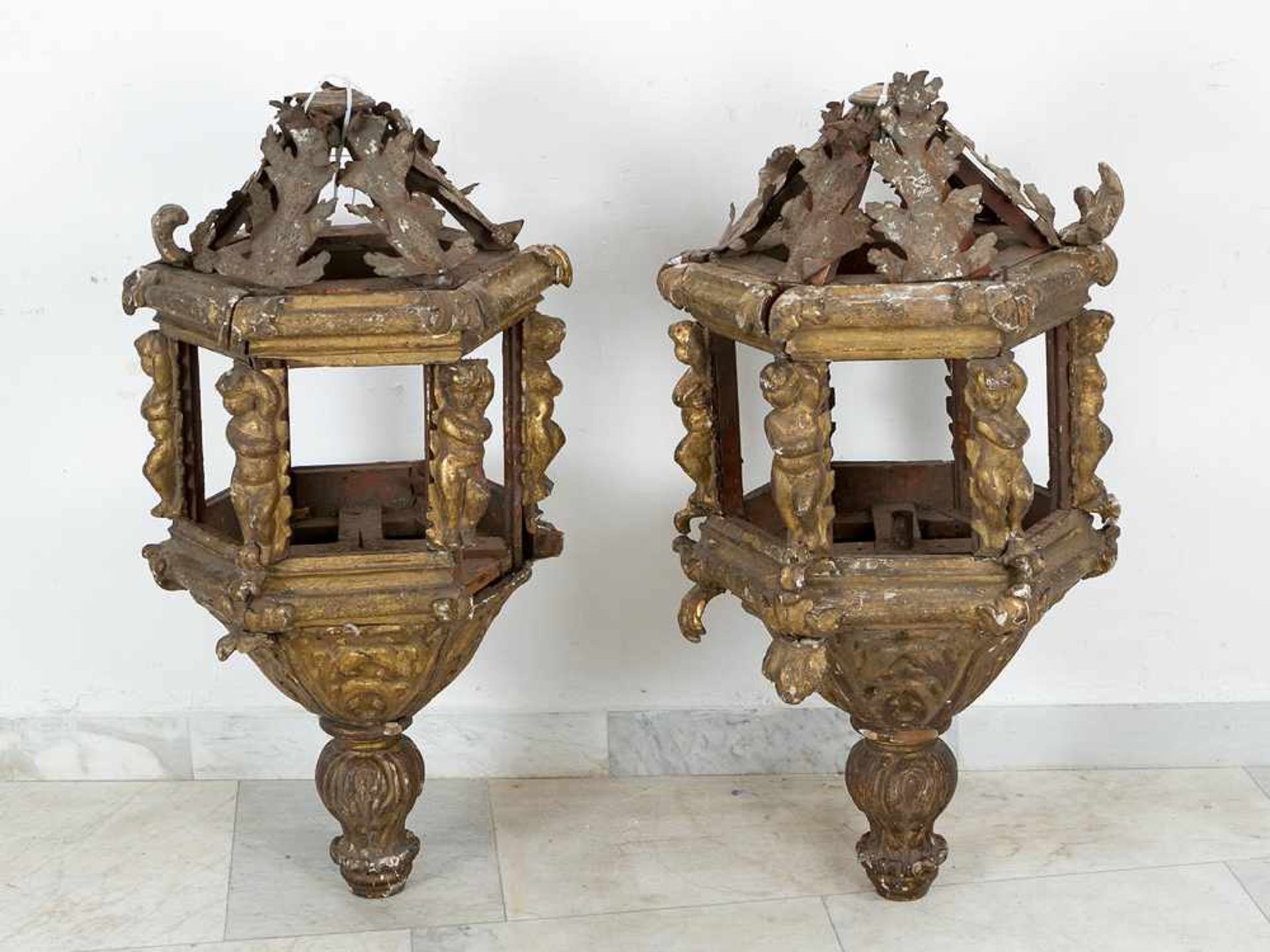 Pair of ship lanterns in hexagonal shape; wood carved with original gilding and partly pounced