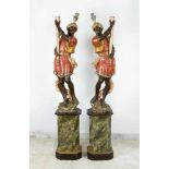 Pair of Venetian Statues, wood carved on original canted bases, with feathers and servant dresses,