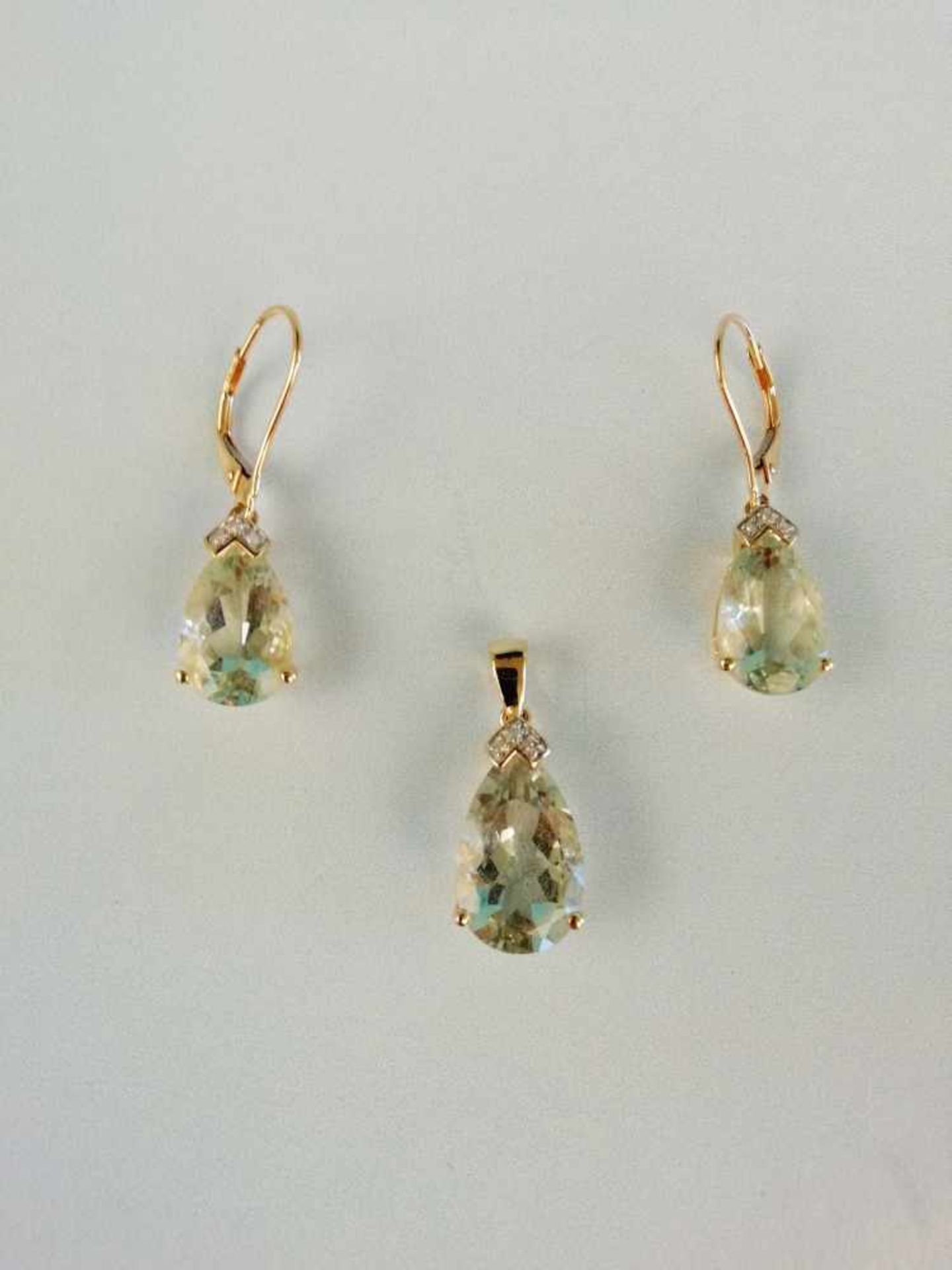 Damenschmuckgarnitur Gold 585 mit Diamanten und Beryll, bestehend aus:1 Paar Ohrringe und 1