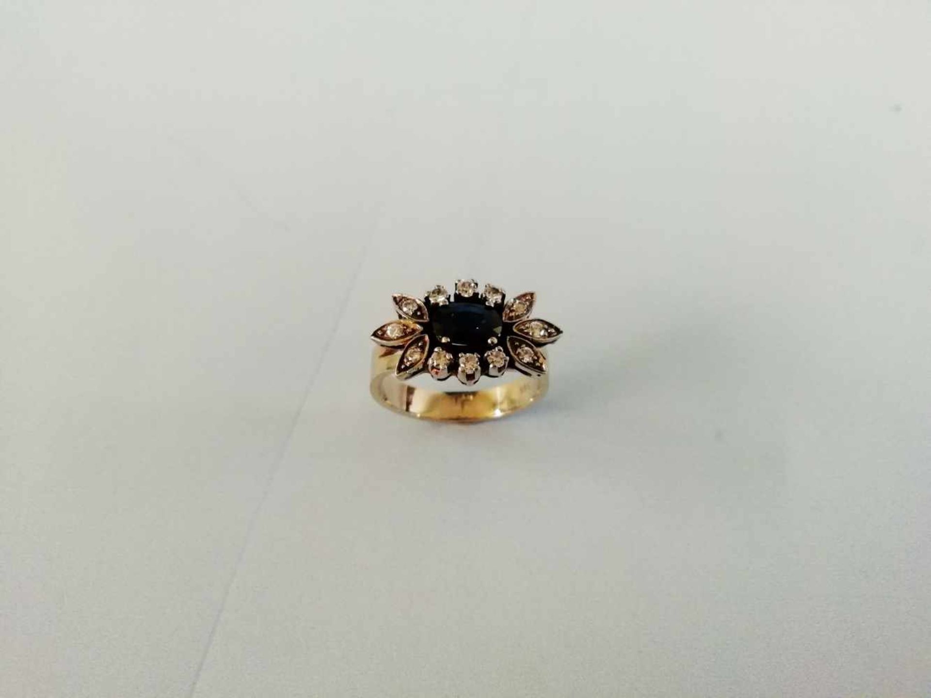 Damenring Weißgold 585 mit Brillanten zus.ca.0,30 ct., und 1 Saphir RW 54, 6 g;