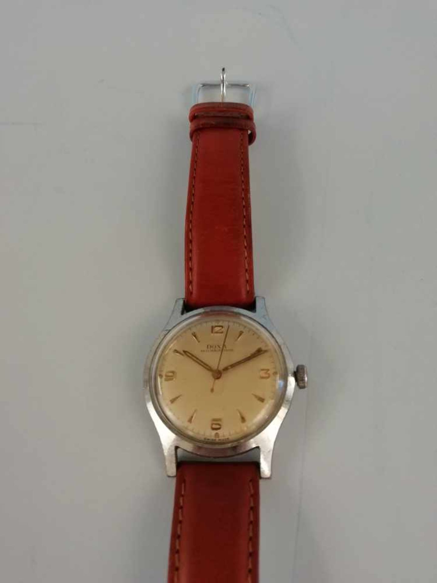 Armbanduhr "Doxa"Metall, Vintage, Ankerwerk, braunes Lederband, 39,1g, Werkservice wird empfohlen,