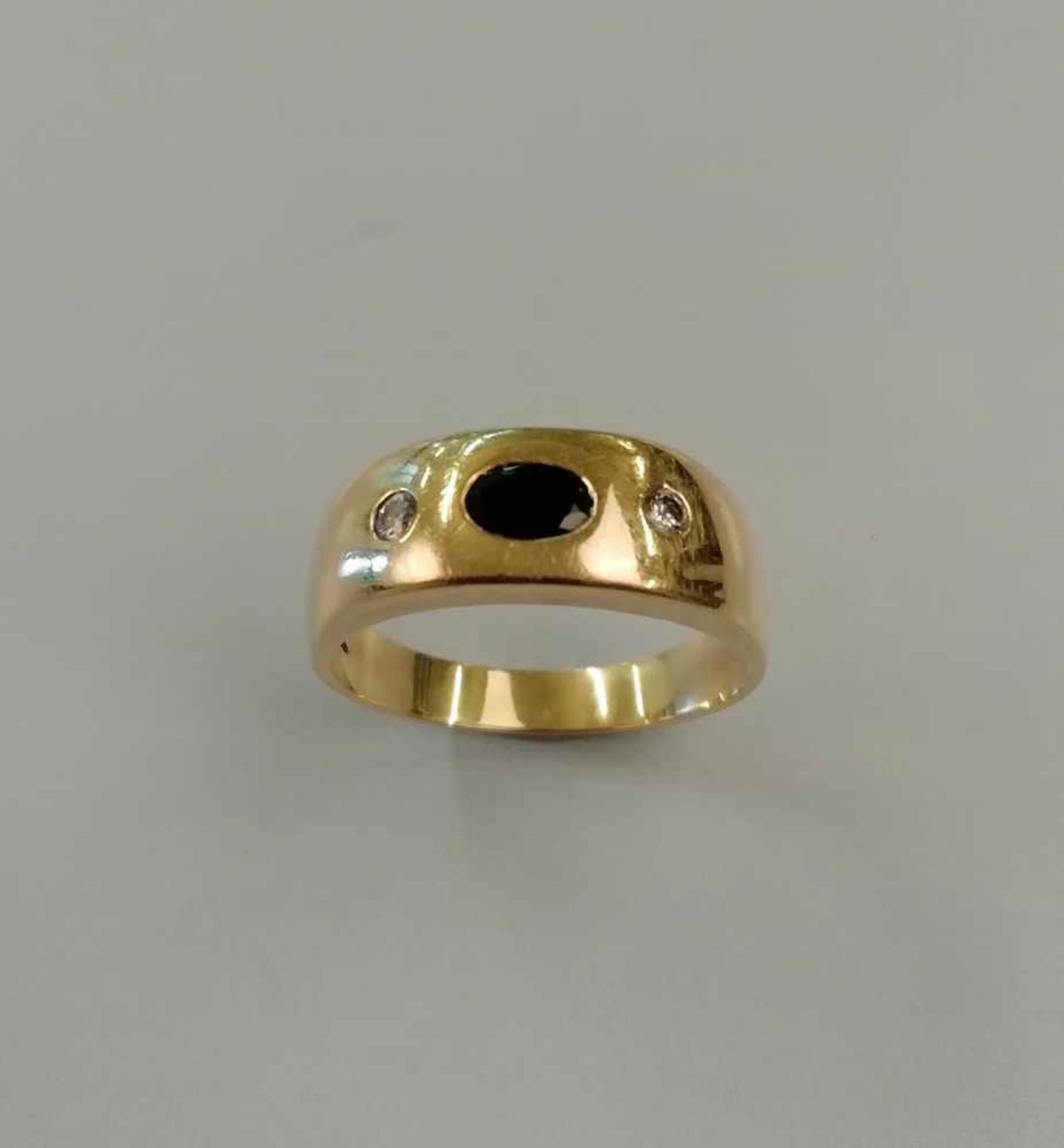 RingGold 585, Brillanten zus. ca. 0,15ct., Saphir, RW 68, 10,4g;