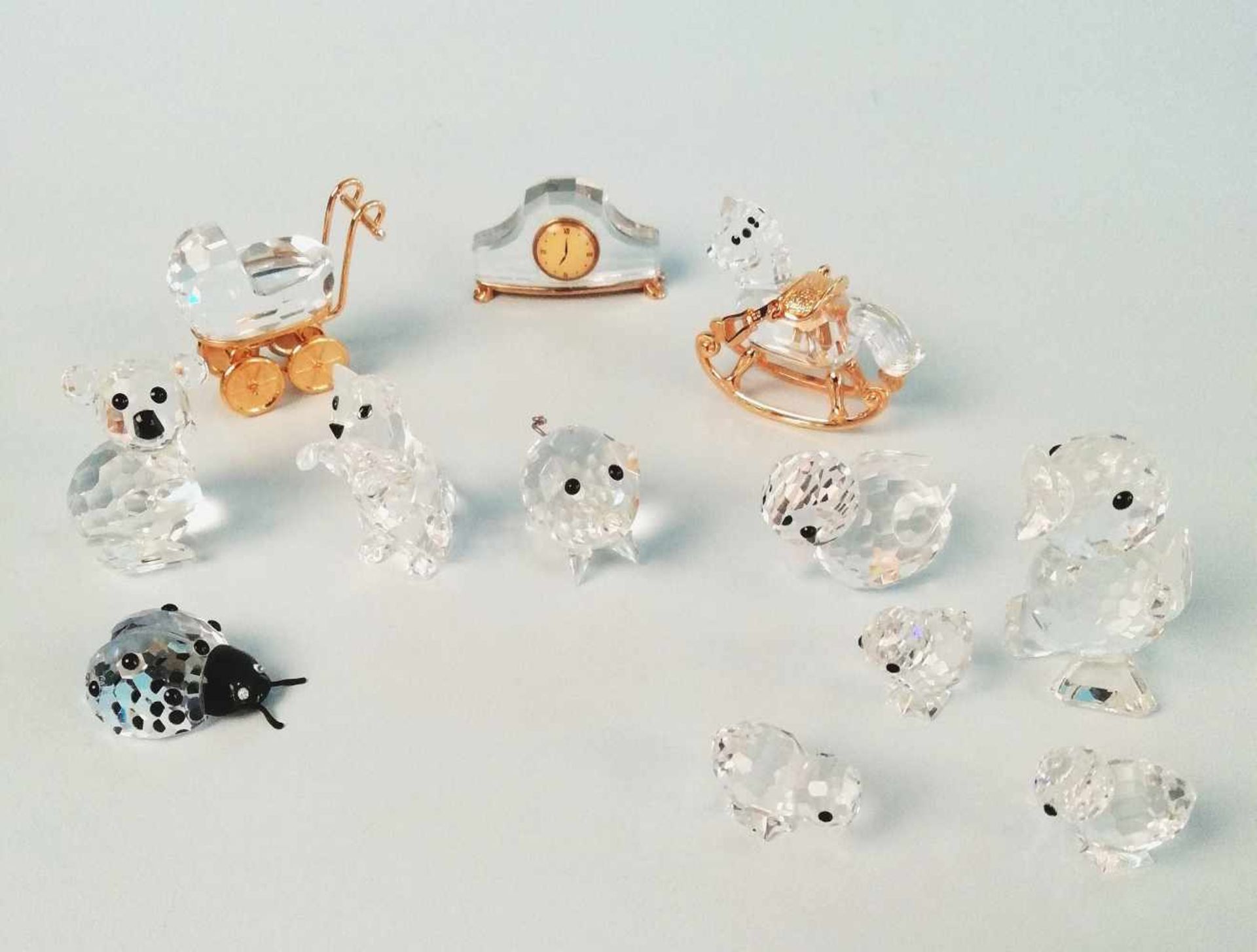 12 Stück SWAROVSKI Figurenunterschiedliche kleine Figuren, farbloses Bleikristall, geschliffen,