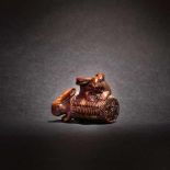 Wooden Netsuke of two rabbits, signature: Nissho, Meiji Era, Japan, the 19th centuryWooden Netsuke