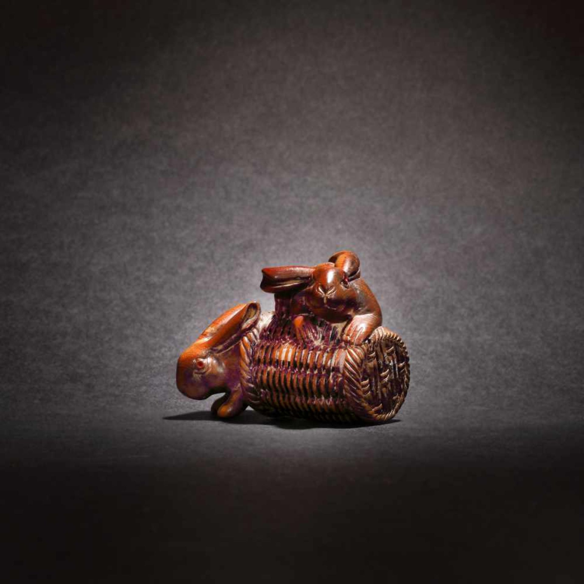 Wooden Netsuke of two rabbits, signature: Nissho, Meiji Era, Japan, the 19th centuryWooden Netsuke