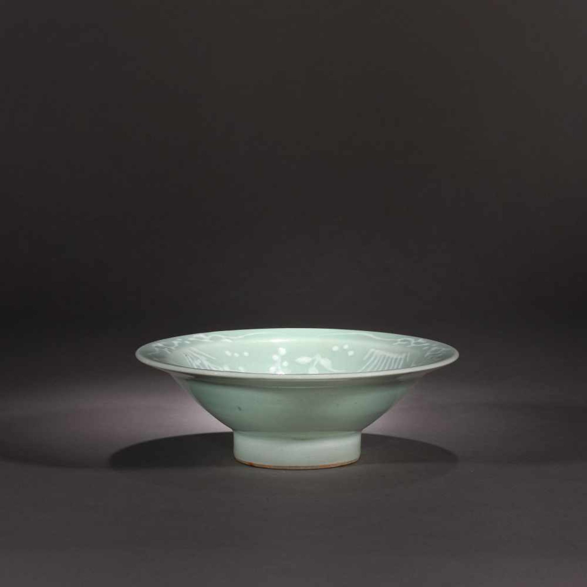 Celadon glaze ceramic bowl with floral vegetal motifs, Kangxi Period, China, ca. 1662-1722Celadon