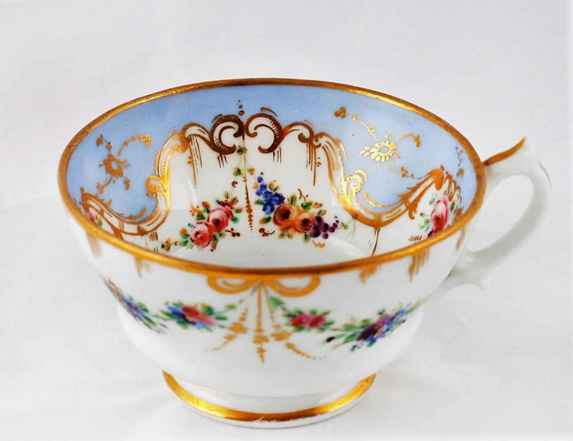 A teacup and a saucer with floral motifs. Porcelain Factory of the Kornilov Brothers. Saint - Image 4 of 11