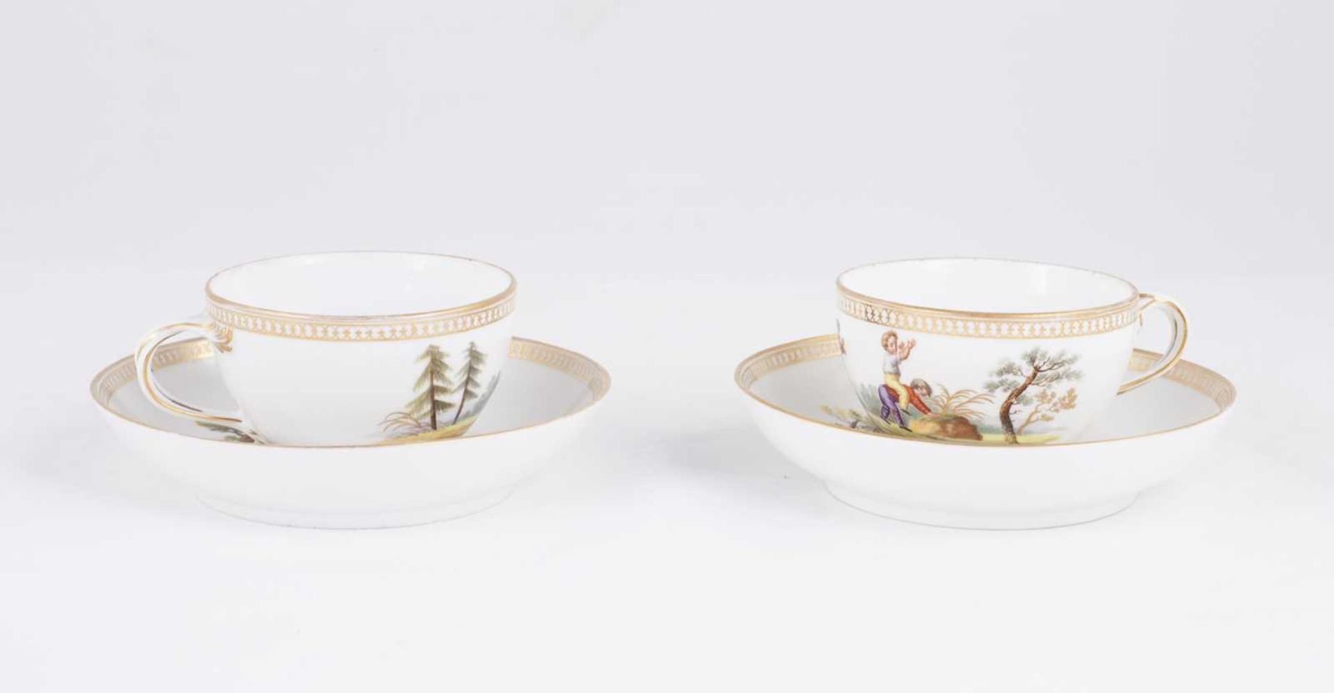 Two tea cup and saucer sets "A child's play". Popov. Moscow. 1850s. Porcelain, gilding, painting.