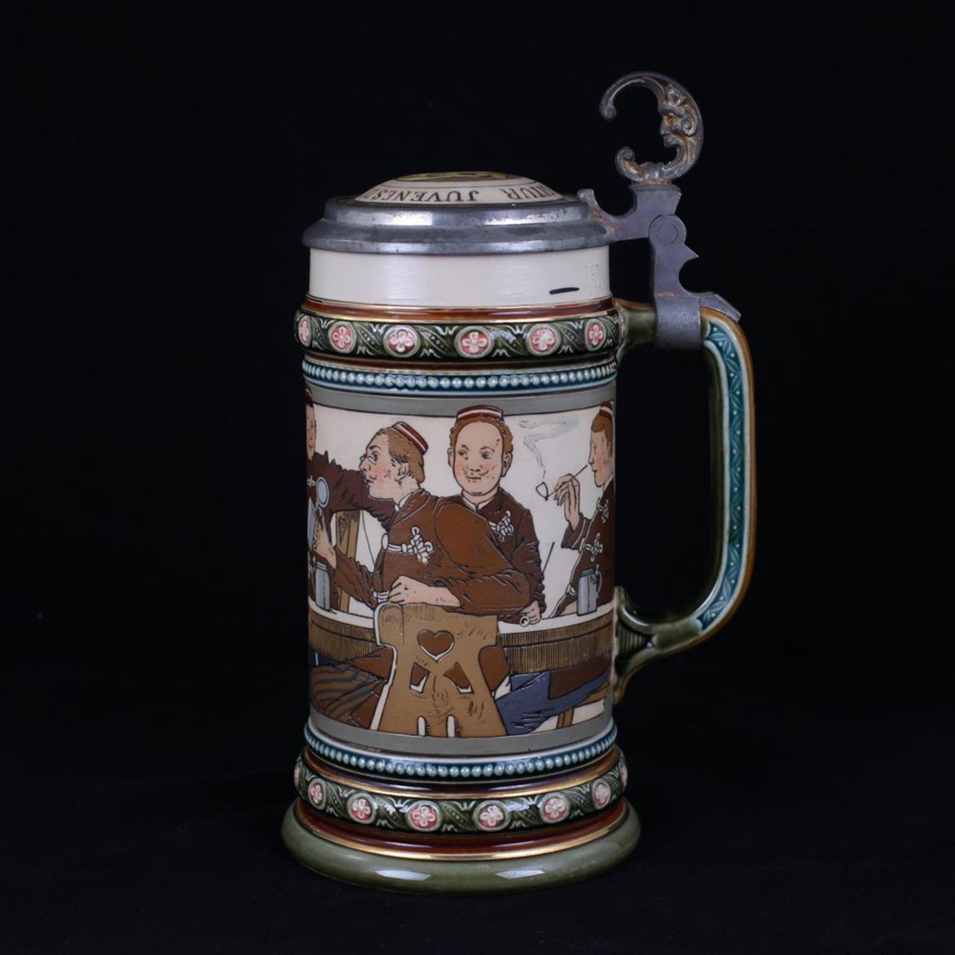 Beer stein with a hymn "Gaudeamus igitur". [1900s].Germany, Mettlach. Villeroy & Boch. Porcelain,