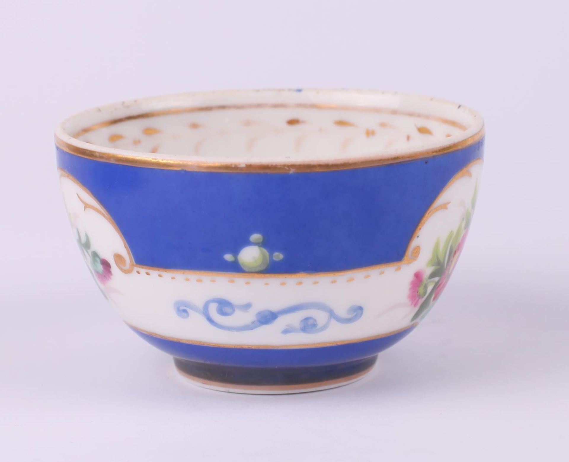 Tea cup and saucer set with floral painting. Russia. 1890s. Porcelain, painting, gilding. Cup: 5x8 - Image 10 of 13