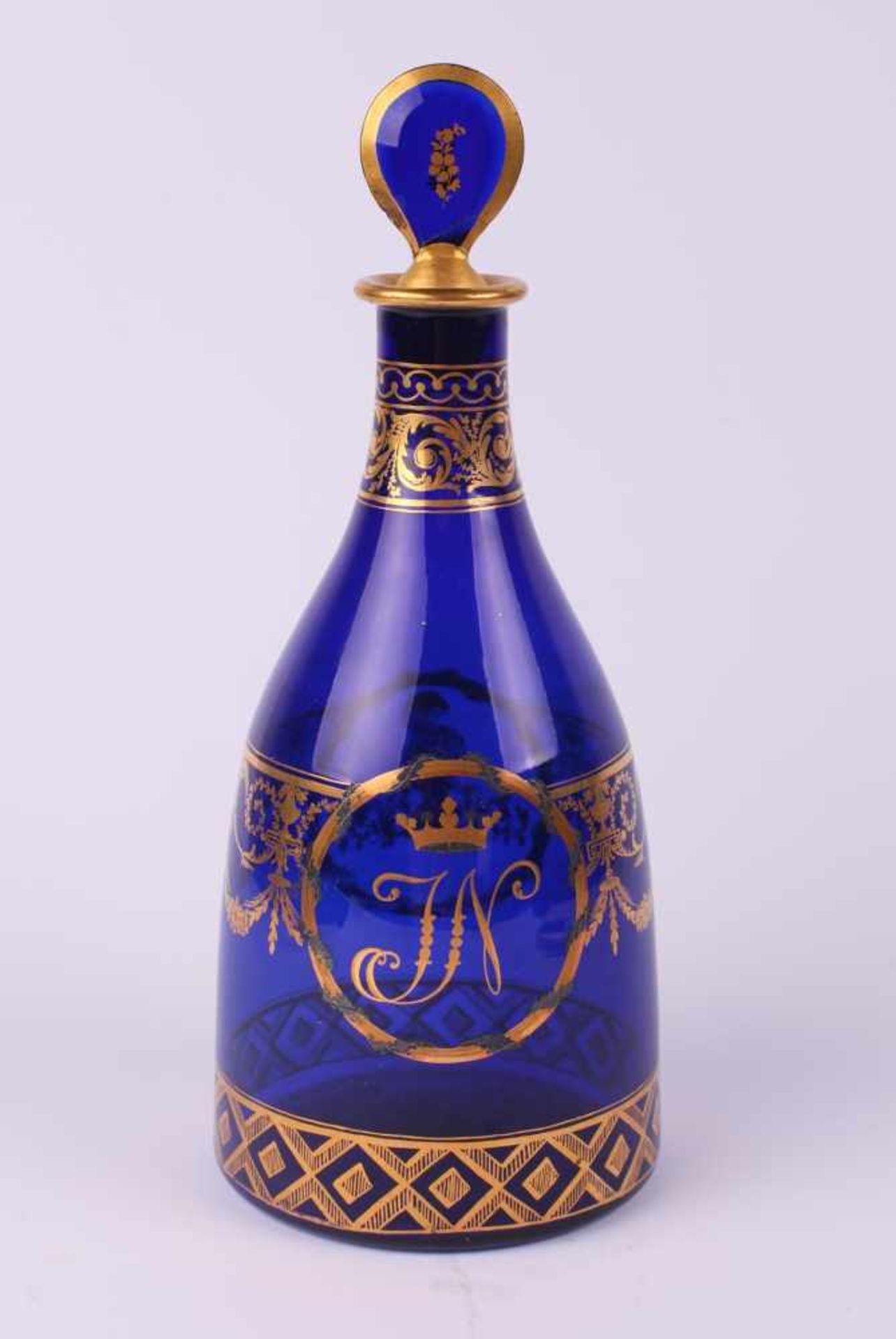 Glass carafe with a cork. [30s of XIX century.][Europe]. Cobalt glass, blowing, gilding. The body