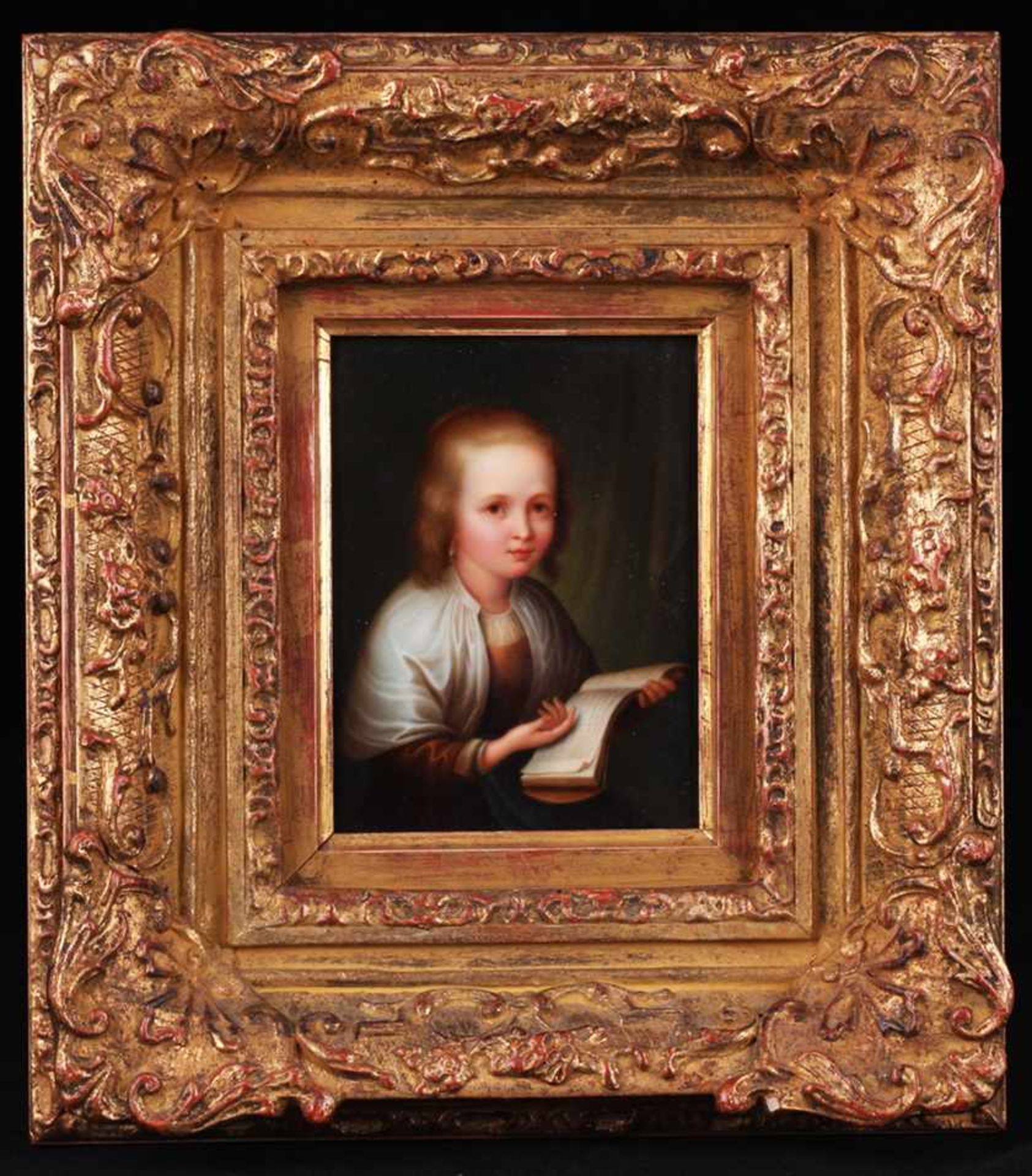 Framed.Miniature Girl with a book. [XIX century]. Painting on porcelain. 11x8 cm.Framed.- - -15.00 %