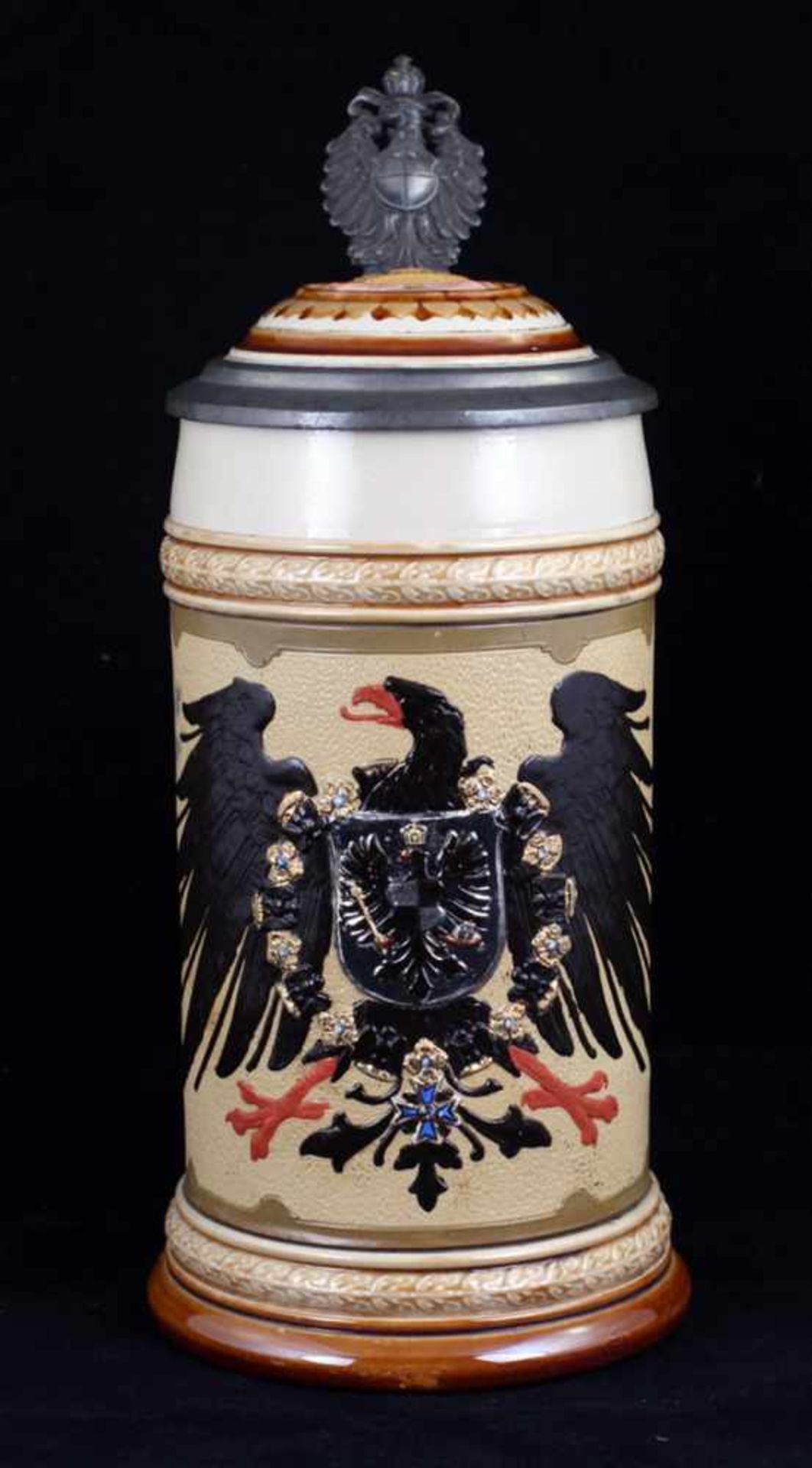 Beer stein with The Reichsadler (Imperial Eagle). [1900s]. Germany. Porcelain, modeling,