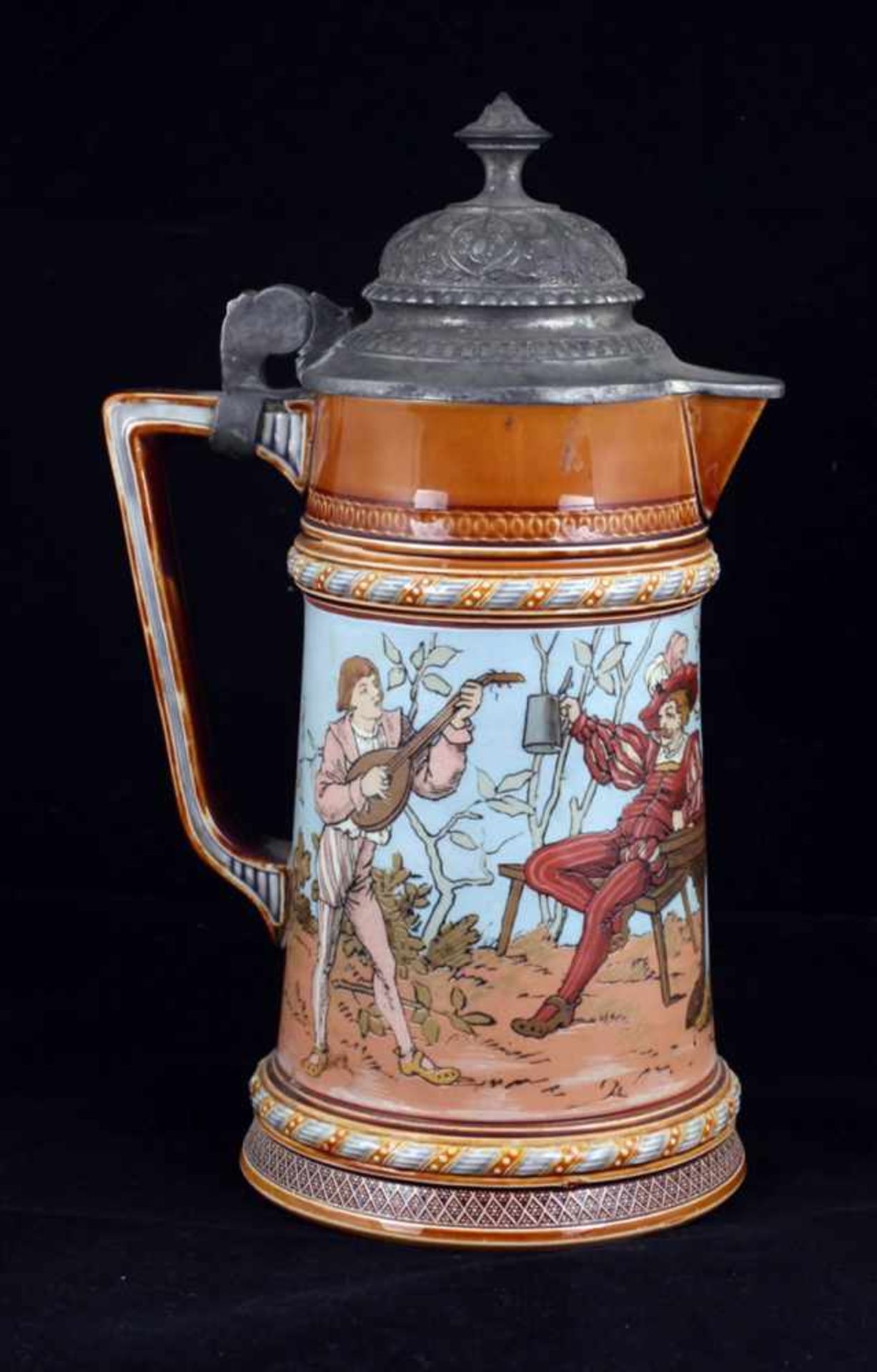 Beer stein with genre scenes. [1900s].Germany. Porcelain, modeling, polychrome painting, gilding,