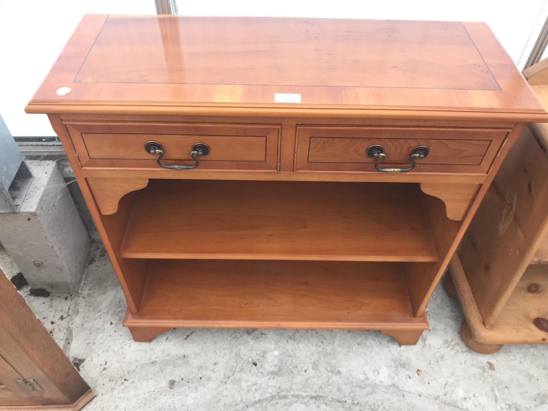 AN INLAID YEW WOOD HALL CABINET WITH TWO DRAWERS AND LOWER SHELVING