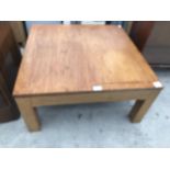 A SQUARE OAK COFFEE TABLE