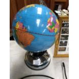 A TOUCH LIGHT UP GLOBE