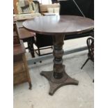 A TALL CIRCULAR PUB TABLE ON TURNED CENTRE PEDESTAL SUPPORT