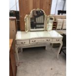 A FRENCH STYLE DRESSING TABLE ON CABRIOLE SUPPORTS WITH THREE DOORS AND THREE SECTION MIRROR
