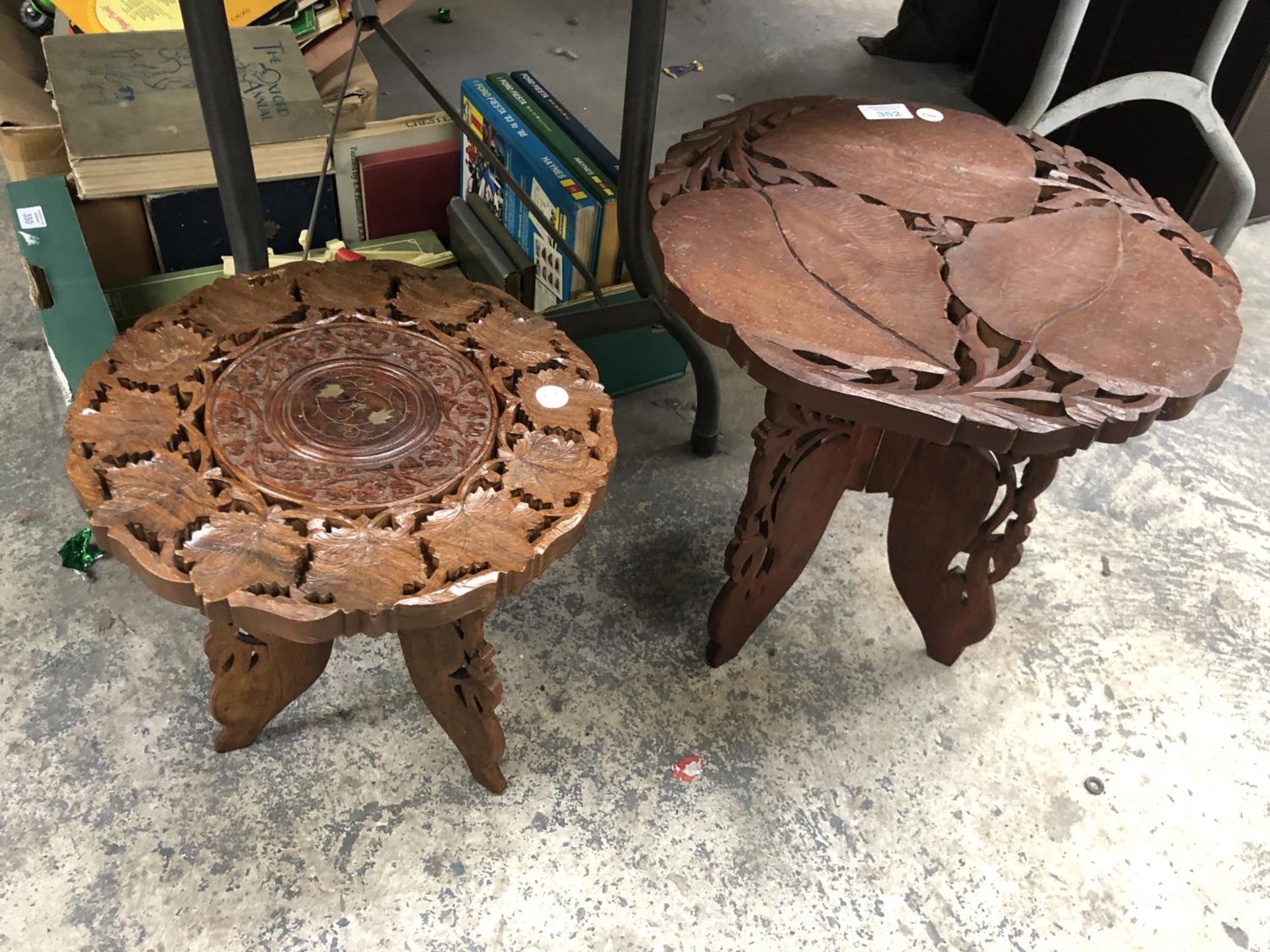 TWO CARVED WOODEN COFFEE TABLES