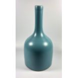 A CHINESE SKY BLUE MONOCHROME BOTTLE VASE, SIGNED QIANLONG MARK TO BASE, HEIGHT 24.5CM