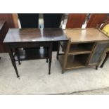 AN OAK DROP END SERVING TABLE AND AN OAK TEA TROLLEY WITH SINGLE LEAD GLAZED DOOR